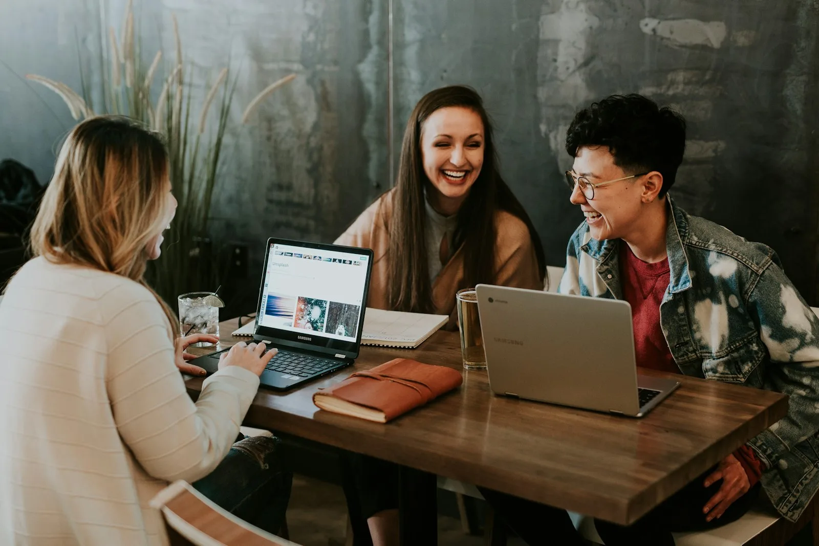 Team working together around a table.